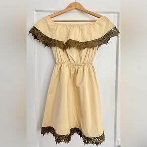 Stellar Pale Yellow Off-Shoulder Dress with Brown Star Trim